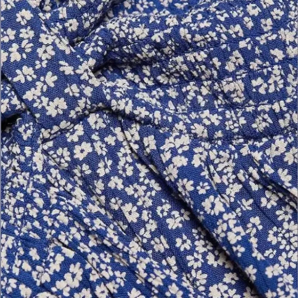 Free People Brittnee Printed Top in the color Blue Combo. NWT size Medium. - Picture 7 of 8